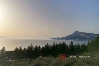 001 2112 01 building lan with sea view omis