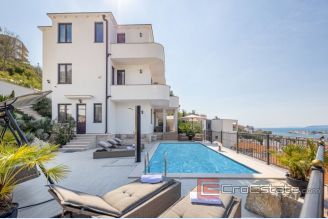 001 2048 44 Split area Modern apartment with pool and a sea view for sale