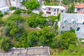 001 2041 107 Brac Stone house in the first row to the sea for sale